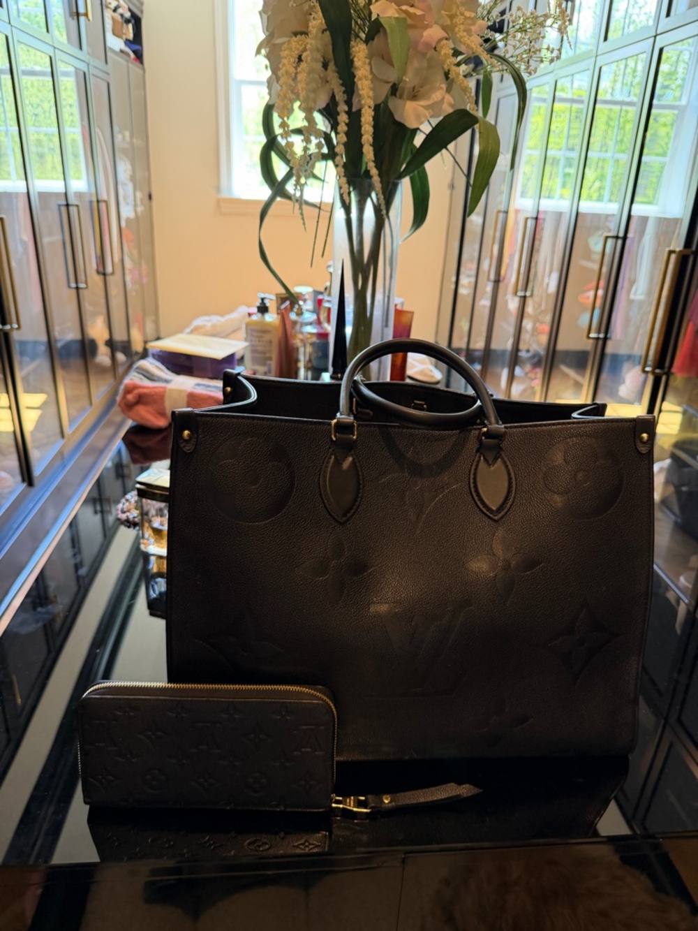 Louis Vuitton Black Leather Tote with Gold Hardware and Orange Interior